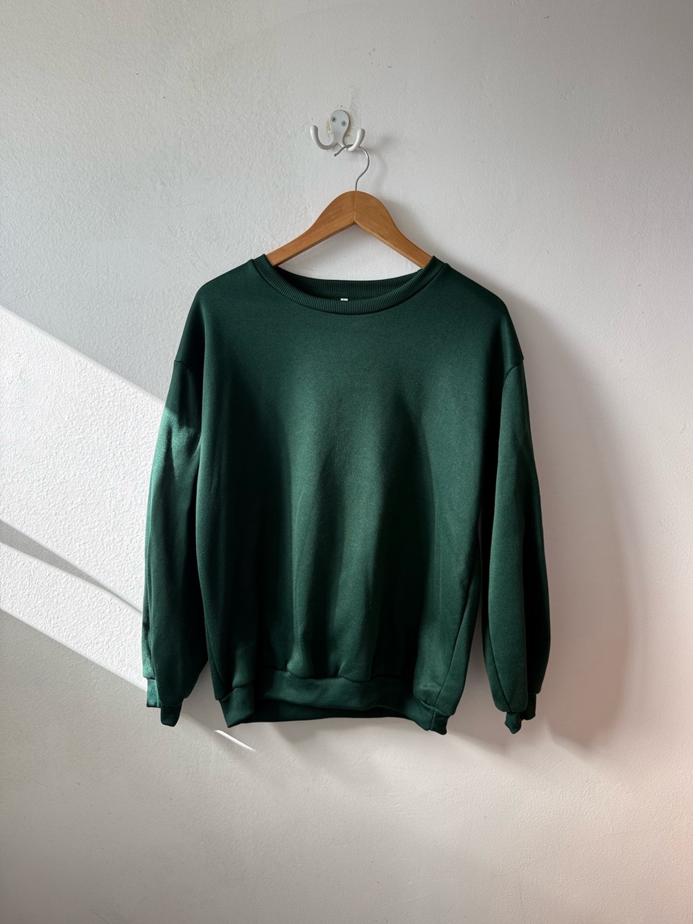green crewneck sweatshirt
